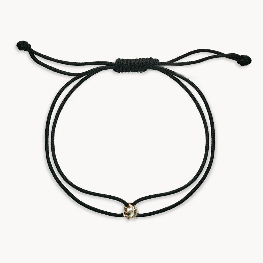 the supernova contemplation cord bracelet - 10k yellow gold, black cord